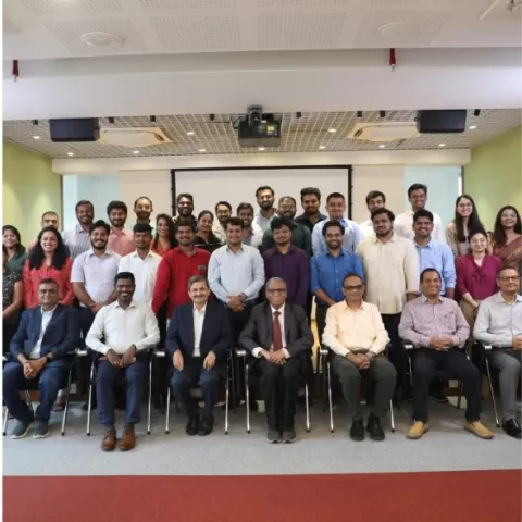 Participants pose for group photo
