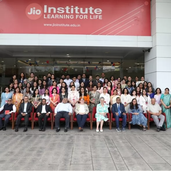 Participants and staff pose before the Programme