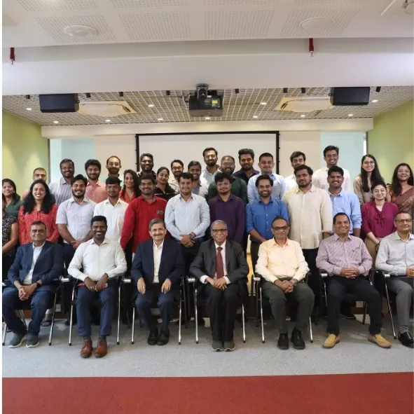 Participants pose for group photo