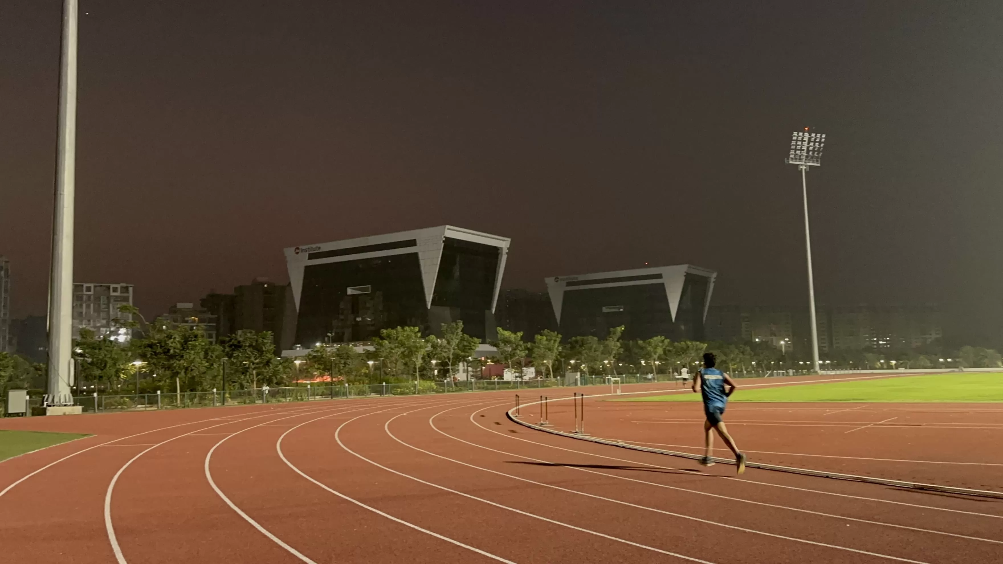 Participant running in the track