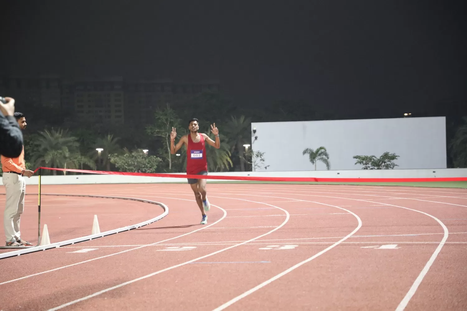 Participant running and close to finish line