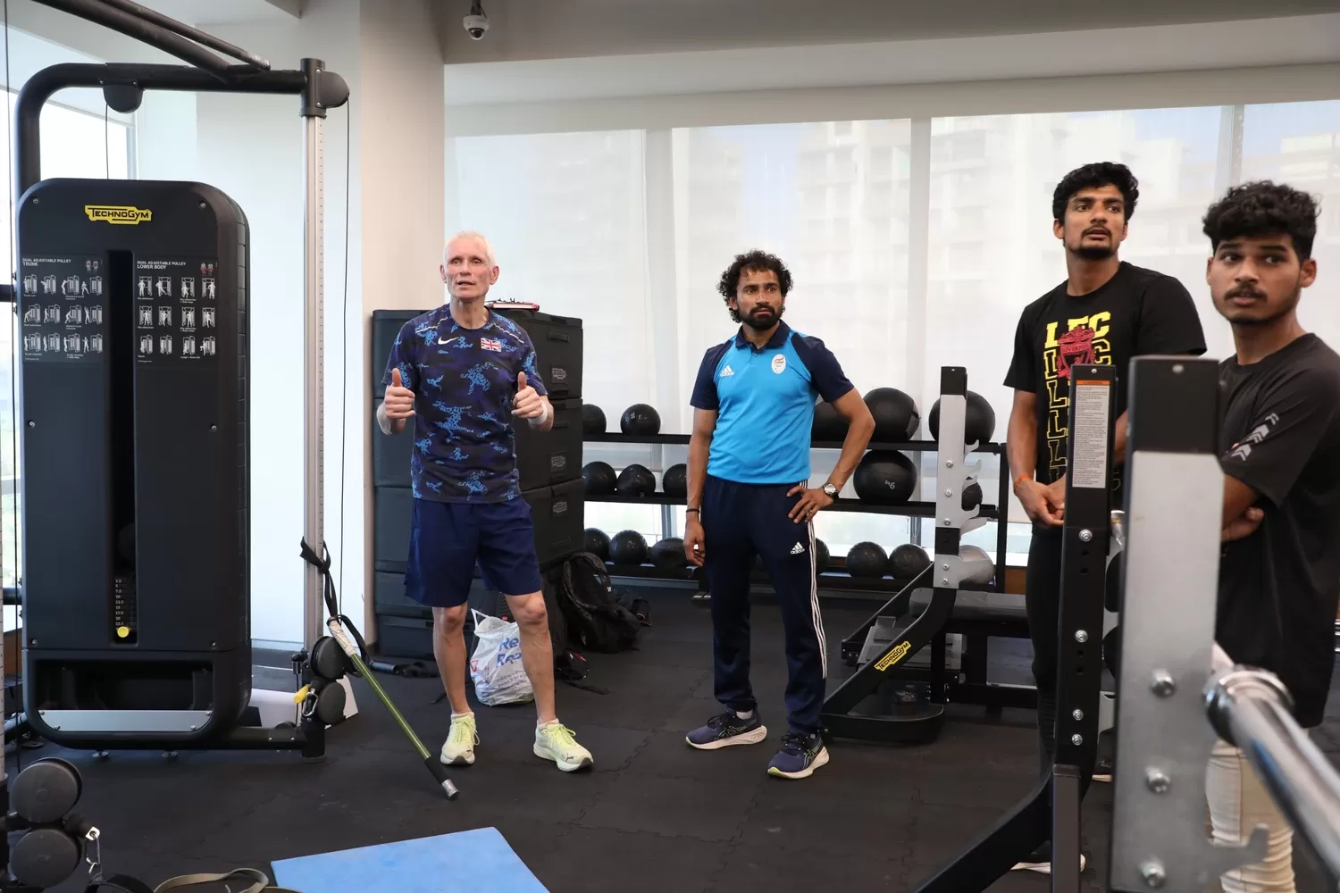 Andy and athletes at Gymnasium