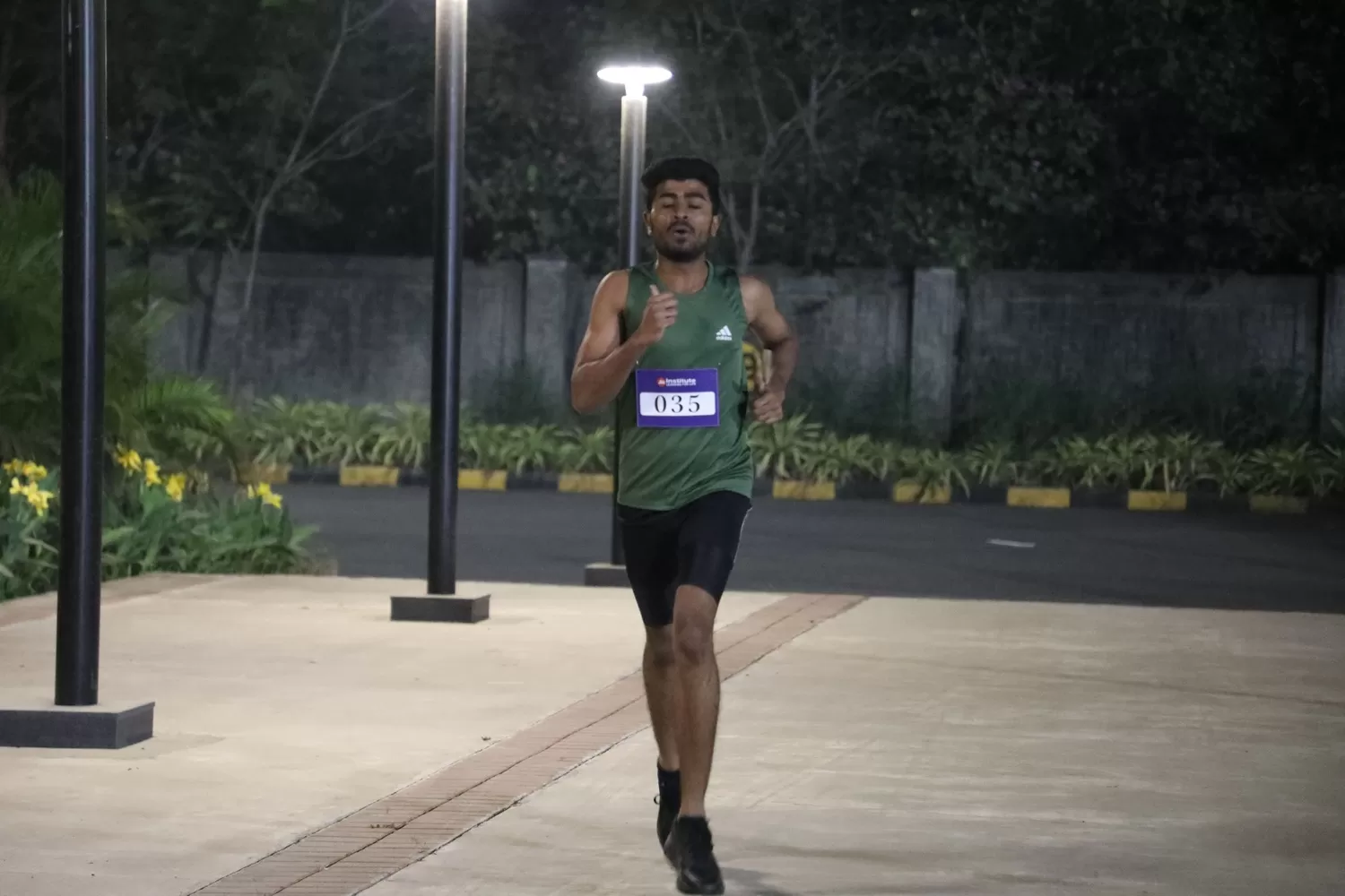 Participant running in the track