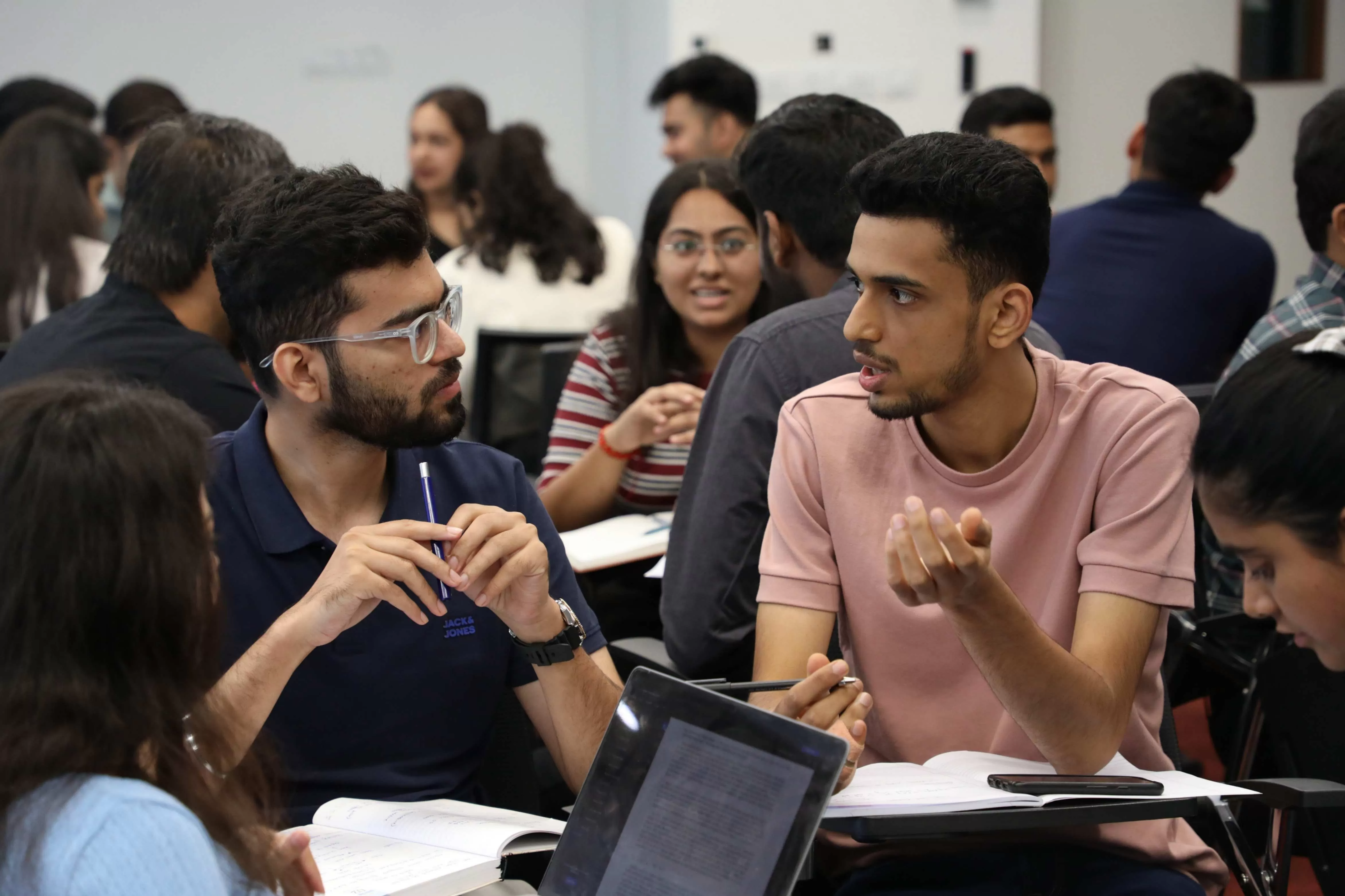 Students discussing case solutions